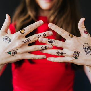 tattoos on hands and fingers